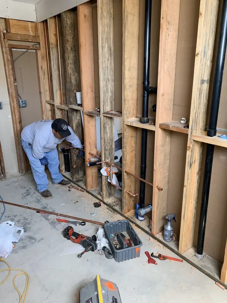 Commercial rough-in plumbing for Water Heater Replacement in Melrose